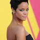 Image for article titled Rihanna Says She's "Doing Well"; TMZ Claims Police Photo Wasn't Stolen
